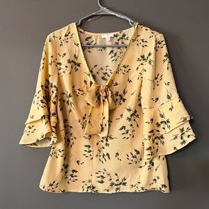 Charming Charlie’s Size Small Yellow low cut floral blouse